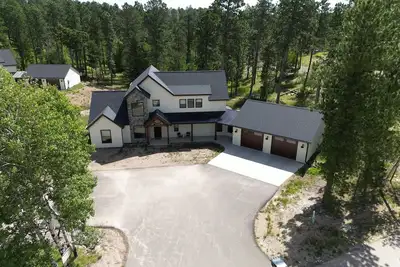 Image de The Juniper - Hot tub, gas fire table, paved roads, ride to Atv trails