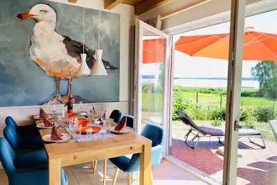 Image de Vacation home \"FriediSee\" in the first row with a panoramic view of the lake