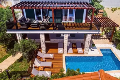 Image de Maison de vacances Stanići pour 1 - 8 personnes avec 4 chambres à coucher - Maison de vacances