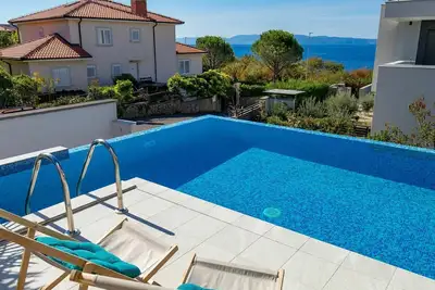 Image de Bel appartement avec Wifi, piscine privée, climatisation, Tv, terrasse, animaux admis, parking