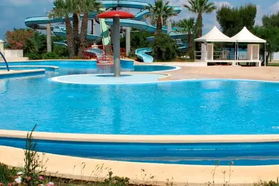 Image de Bel appartement dans une maison de vacances avec climatisation, Wifi, piscine, terrasse et parking