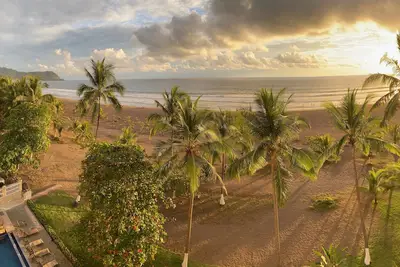 Beautiful ocean front condo with 200 square foot balcony overlooking Jaco Beach.
