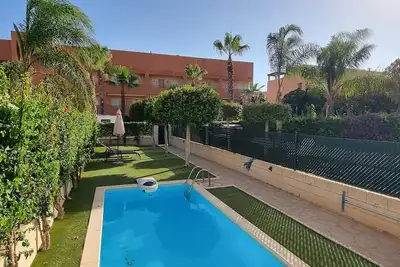 Image de Rez-de-chaussée avec jardin et piscine privée, tres proche de la plage, Wifi