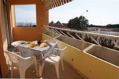 Image de Appartement cosy avec terrasse, 180m de la plage-Beahost