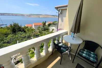 Image de Appartement de vacances avec deux chambres et vue sur la mer