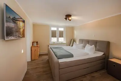 Image de Cozy vacation apartment in Heringsdorf with large garden & whirlpool - only