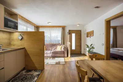 Image de Appartement 'Ciasa Rungg App Pares' avec vue sur les montagnes, jardin et Wi-Fi