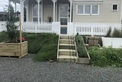 Beautiful Tiny House with communal water hole.