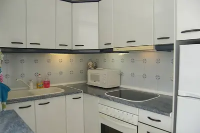 Image de Pleasant apartment in private residence with community pool.