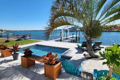Hidden Gem! Treasure Island Waterfront 2/2 with a pool and dock!