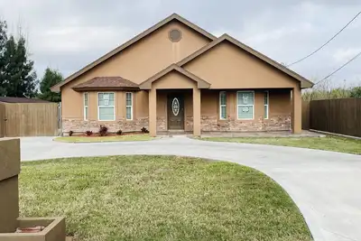 New Modern House near Hospital, shopping centers with backyard and Resaca view.