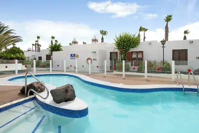 Image de Appartement 'Puerto Chico M' avec vue sur mer et Jardin