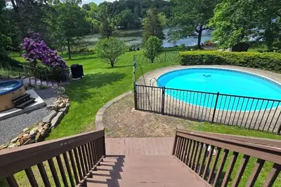 Image de Lakefront retreat with stellar water views just a short drive from West. . .