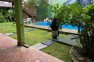 Image de Suítes aconchegantes com piscina e praia