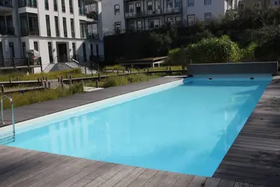 Image de Pool and sauna with sea view, directly at the pier - First Sellin FeWo 2. 3 -