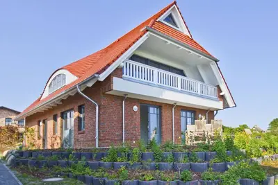 Image de Cozy vacation apartment with terrace and garden - Ferienhaus Zaunkönig FeWo Eg - Holiday home