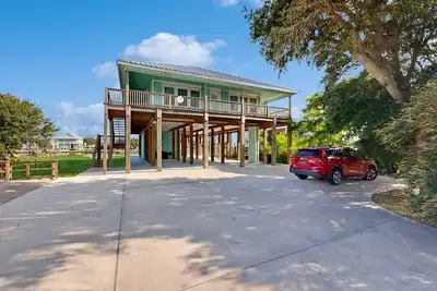 Image de 2 New Canal-Front Homes | Private Pier, Chef’s Kitchens & Outdoor Living