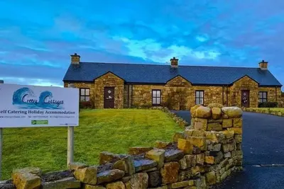 Image de The Moor by Creevy Cottages are 1 minute to pier \/ sea