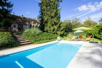 Image de Maison 8 pers avec piscine chauffée, jardin et WiFi à Montignac