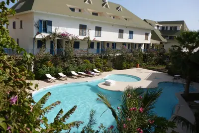 Image de One Bedroom Apartment in lovely beach front complex with pool