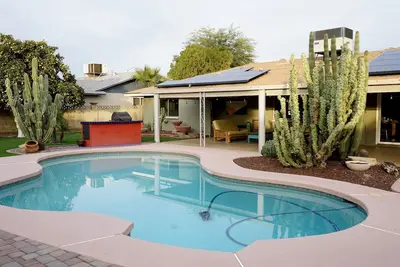 Boho style home | Heated pool | Bbq | Covered patio | Entertaining backyard