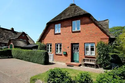 Image de Ohl Dörp 49b, Aanthuus - Half of a house in Wrixum under thatched roof with 3 rooms and
