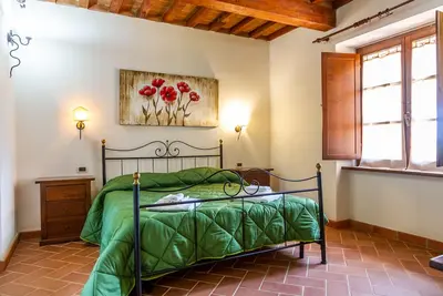Image de Appartement 'Casa Vacanza Il Carpignone 2' avec vue sur le lac, piscine et jardin