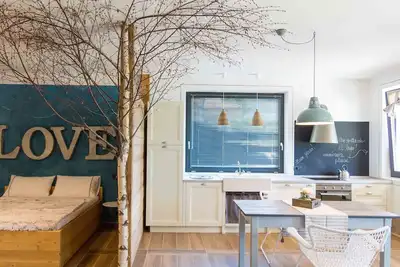 Image de Openspace three-room apartment with lake view
