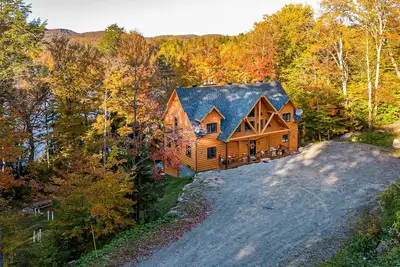 Image de Chalet rustique et luxueux sur le bord d'un lac