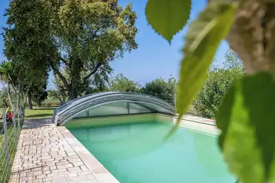 Image de Appartamento Casa Rurale Gorgona' avec vue sur la mer, piscine, Wi-Fi et jardin