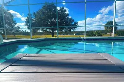 Image de 5 Bed 3 Bath Villa On Golf Course Near Disney/Universal/Mco