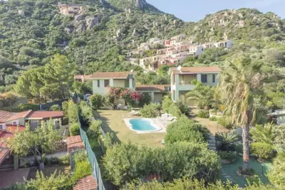 Image de Stella con piscina comune (Rei101) by Interhome