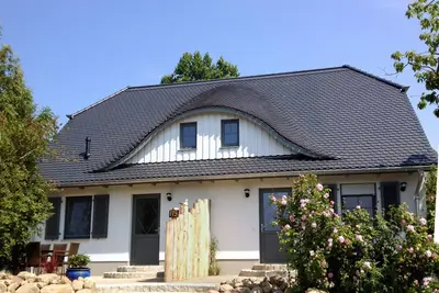Image de House Lee - 500 meters from the beach, you can hear the Baltic Sea waves here.