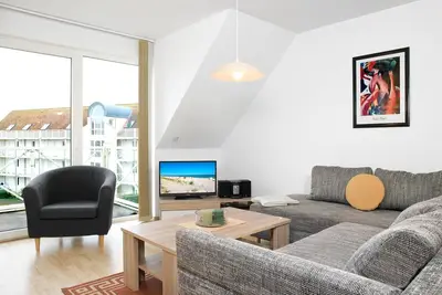 Image de Apt. \"Windspiel\" - Bright 3-room apartment directly at the harbor of Kirchdorf.