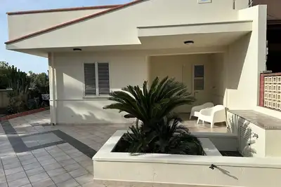 Image de Maison de vacances 'Cycas' avec terrasse privée, jardin privé et climatisation
