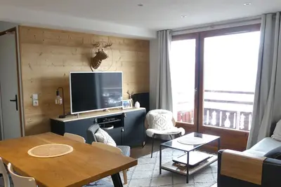 Image de Appartement chaleureux à 1800 avec accès direct aux pistes
