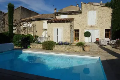 Image de Renovated stone house with private walled garden, heated pool, in quiet village.
