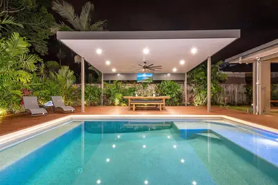 Image de Paradiso Family Home - Heated pool, 1 min drive to Palmer Sea Reef Golf Club!
