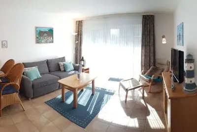 Image de Bright, comfortably furnished apartment directly on the dike and beach! - Residence