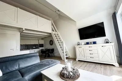 Image de Bright, comfortably furnished apartment directly on the dike and beach! - Residence