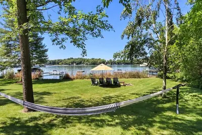 Image de Spacious, Upscale Whitewater Lake Home |200+ Ft of Lake Frontage |Swim Deck |Docks |Screened Porch