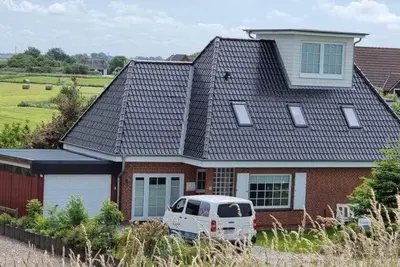 Image de Ferienhaus \"Deich 14\"