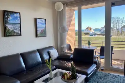 Image de A stone's throw to the beach! - House on the dike