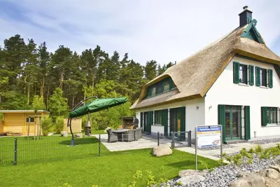 Image de Ferienhaus Seehund - House in a great location with garden, terrace and own sauna - Ferienhaus Seehund