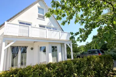 Image de Ferienwohnung Neptun - cozy 3-room vacation apartment with terrace and garden - Holiday apartment