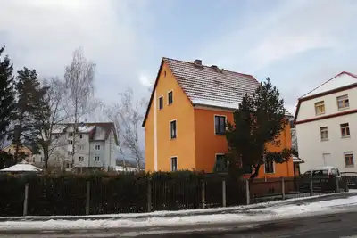 Image de 5 minutes to Lake Olbersdorf, vacation apartment with fireplace