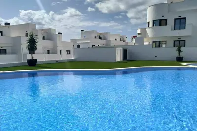 Image de Confortable appartement avec piscine, Wifi, climatisation, Tv, patio, vue panoramique et parking