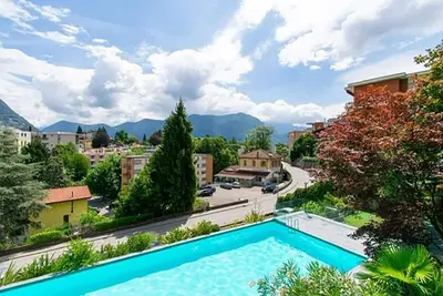 Apartment with swimming pool overlooking the lake with