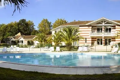 Image de Maison \"Le domaine des Sables\" à Soulac avec internet, piscines et océan proche
