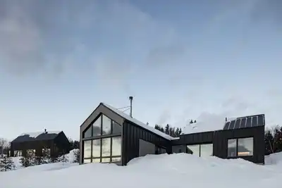 Image de Le Chalet du bois flotté. La place dans Charlevoix. . .